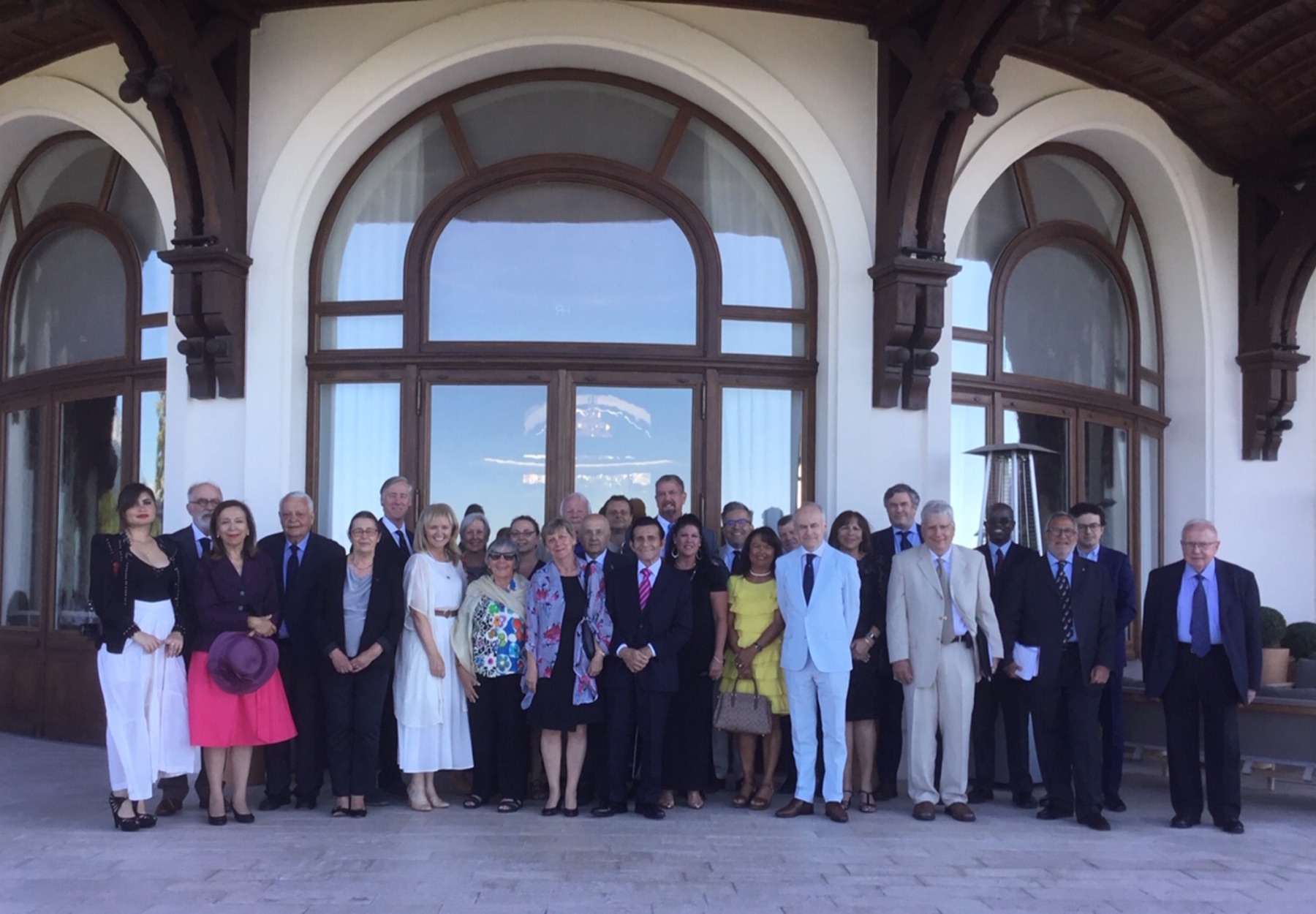 Delegates of the 2018 Évian Revisited symposium gathered on the terrace of the Hotel Royal